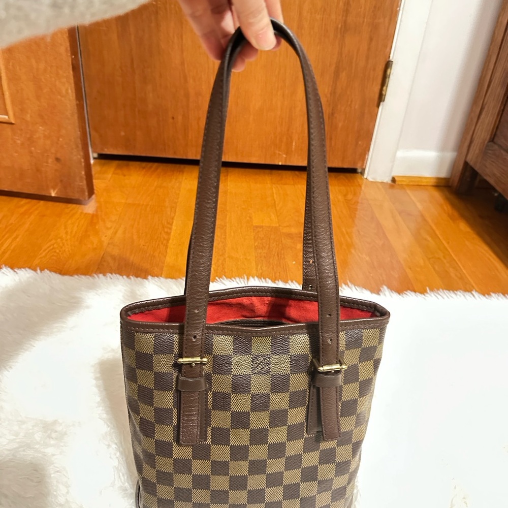 Authentic Louis Vuitton Damien Ebene bucket Marais with Red Interior